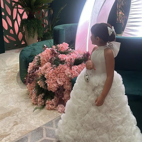 Elegant White Floral Appliqué Flower Girl Gown with Oversized Bow Back and Cape
