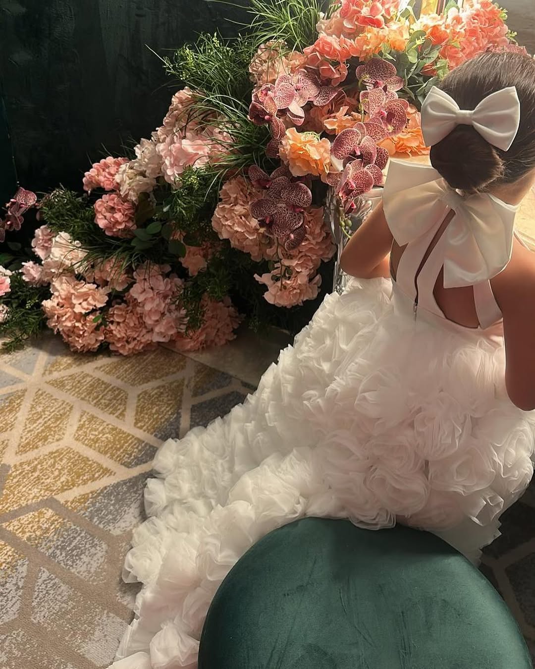 Elegant White Floral Appliqué Flower Girl Gown with Oversized Bow Back and Cape